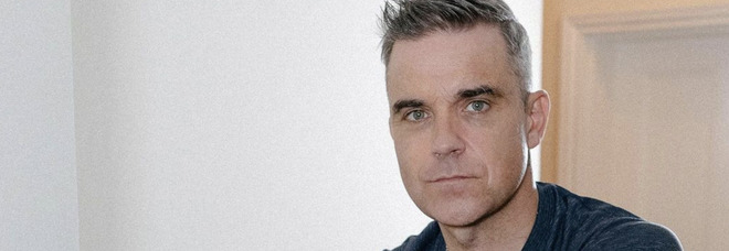 Robbie Williams choc: «Un killer voleva uccidermi». La terribile rivelazione