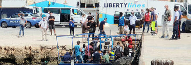 Migranti, 14 sbarchi in un poche ore a Lampedusa: 1.215 persone in hotspot. Al via i trasferimenti