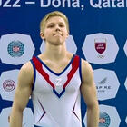 Ivan Kuliak, l'atleta russo sul podio con la Z simbolo dell'invasione (accanto al vincitore ucraino)